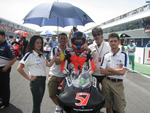 Image of Chaz and the Aprilia Germany team on the grid